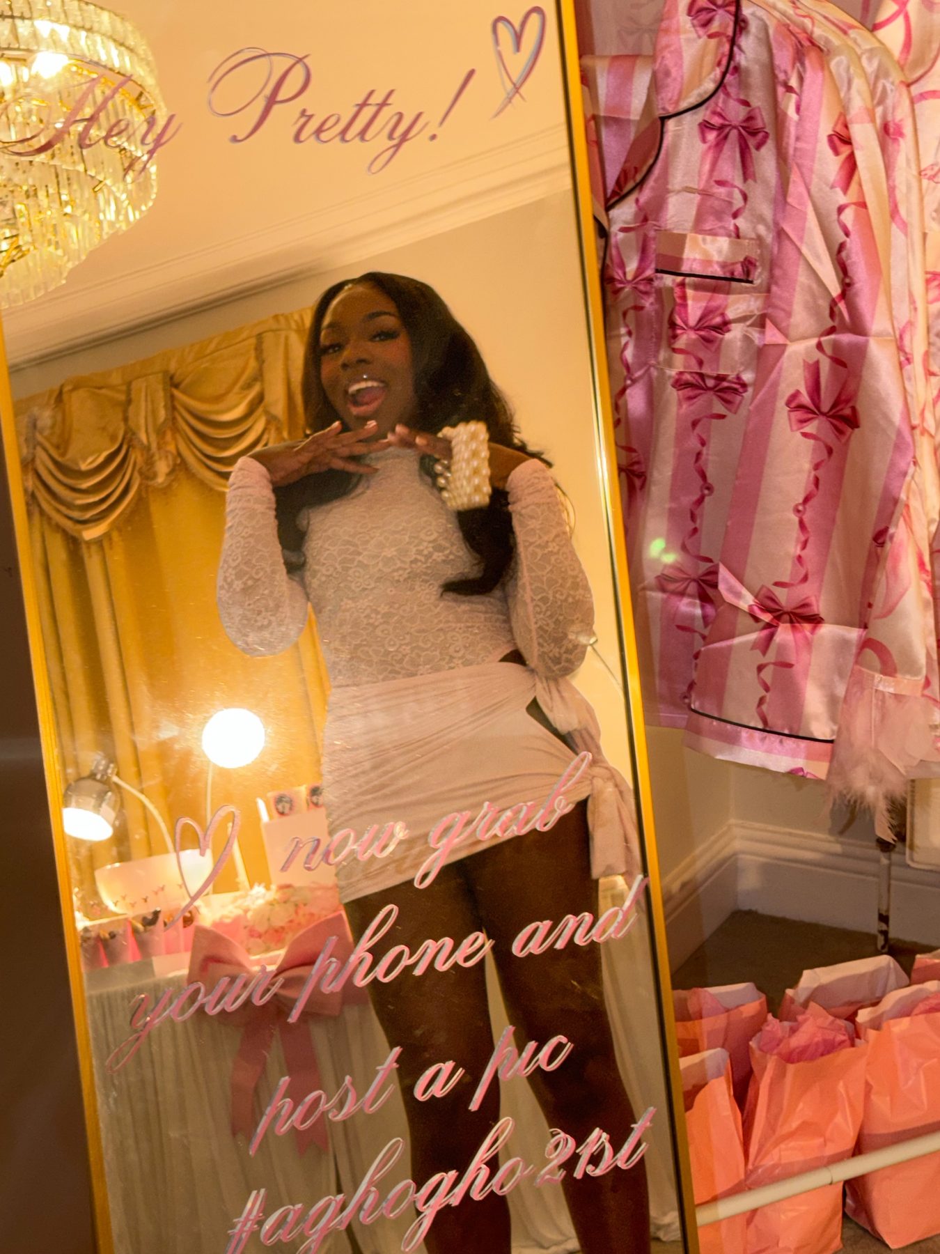 Gold mirror with handwritten party lettering